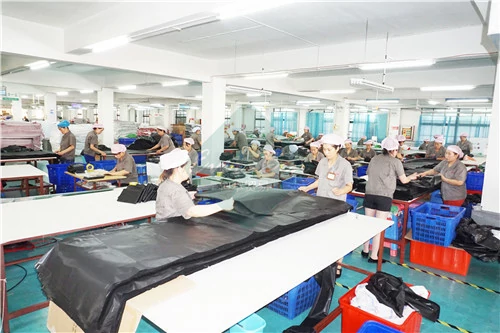 Quality Check and Packing workshop of the raincoats