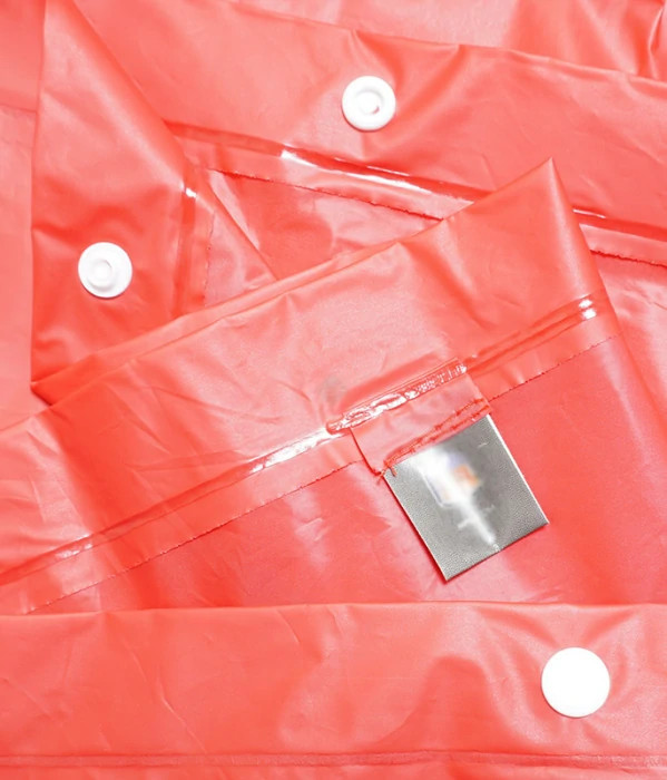 buttons labels on red peva rain ponchos